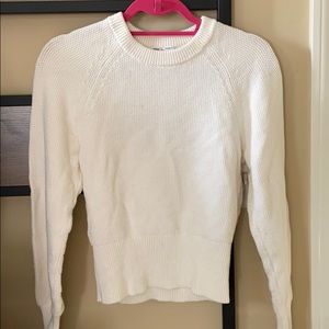 Cream sweater with well designed details